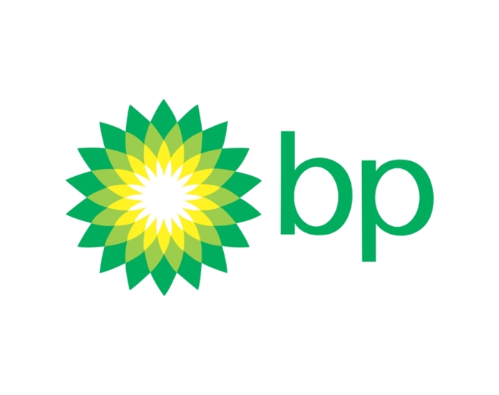Logótipo da BP com um desenho de uma explosão solar verde e amarela junto às letras minúsculas "bp" em verde.
